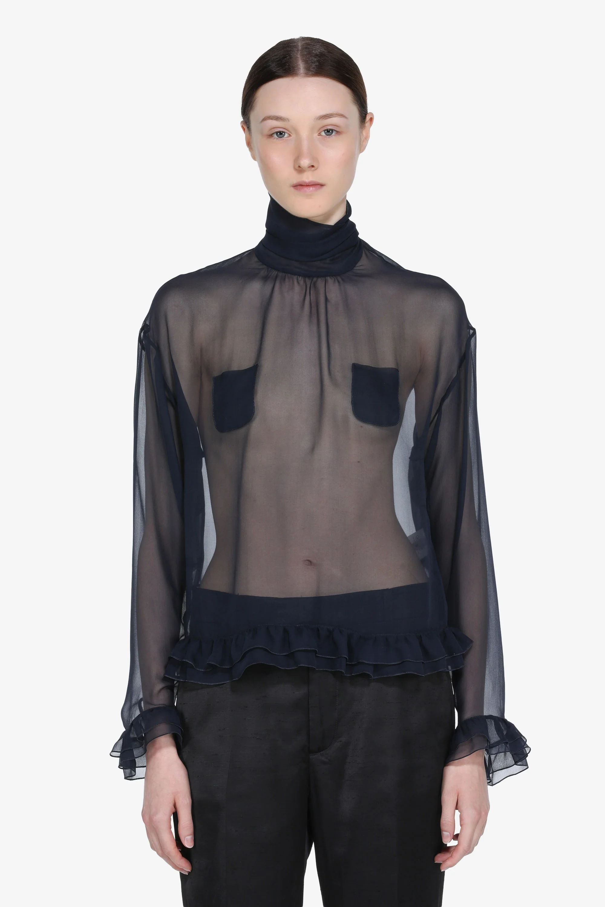 Blusa trasparente con fiocco
