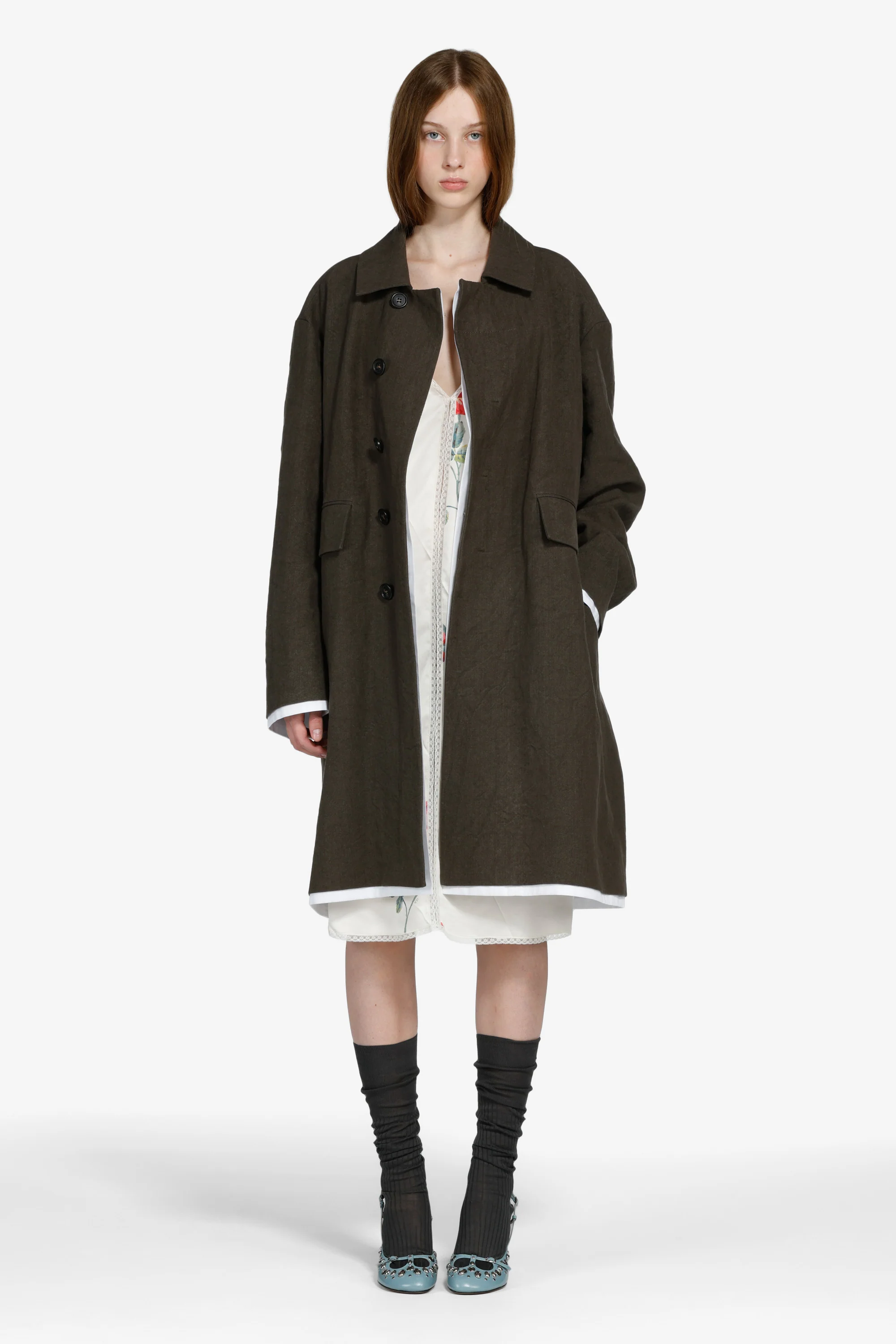 Cappotto monopetto con orlo a contrasto